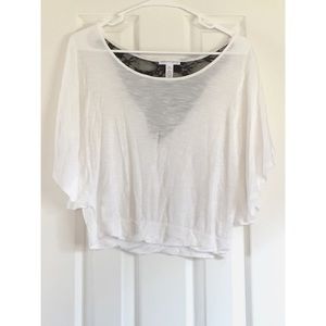 White flowy blouse with lace in back